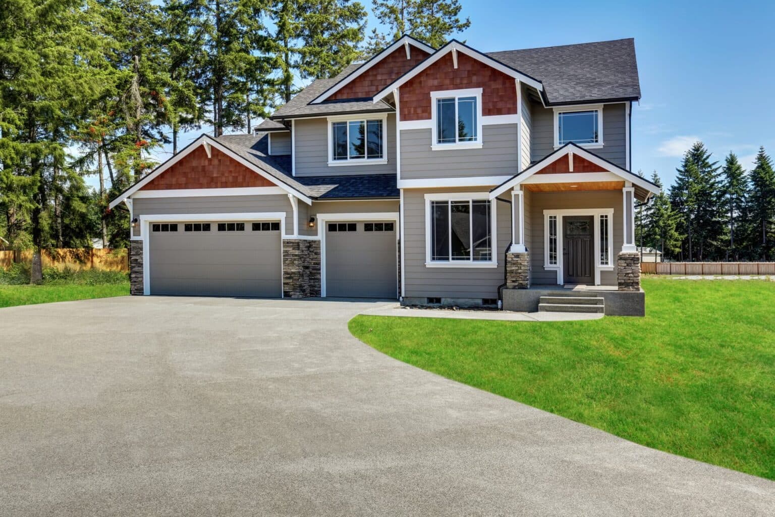 Concrete driveway in front of a residential home