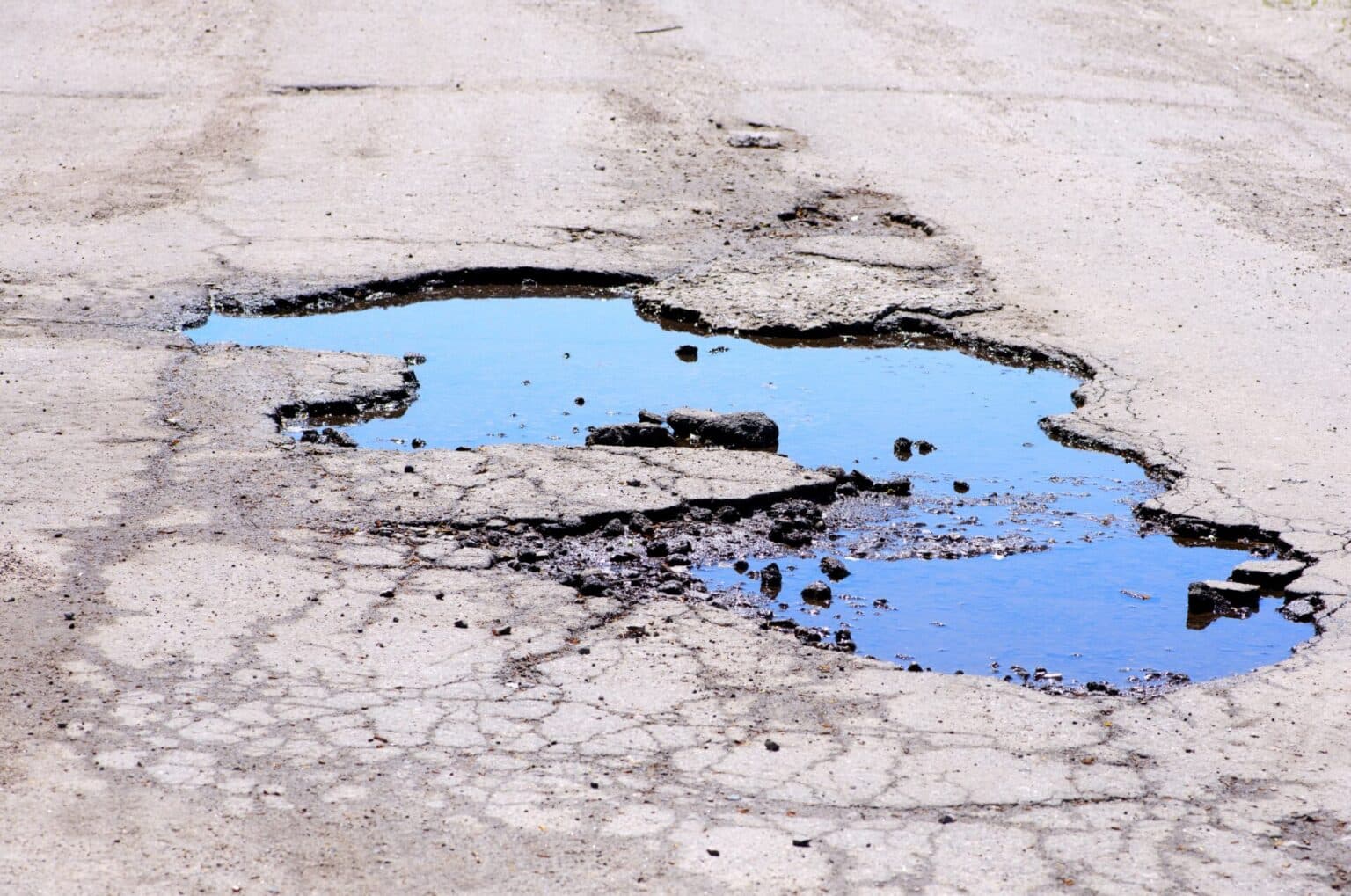 Close-up of a residential concrete driveway surface