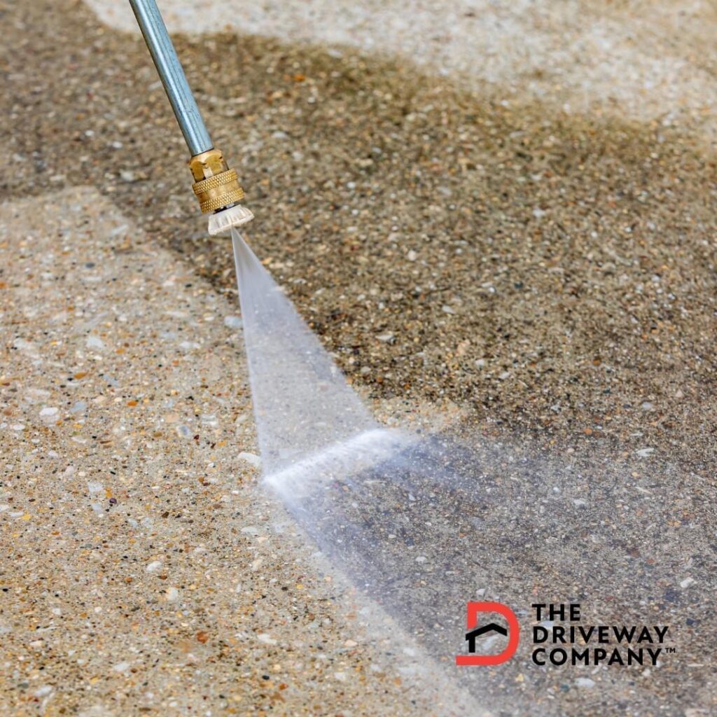 pressure washing concrete with driveway logo